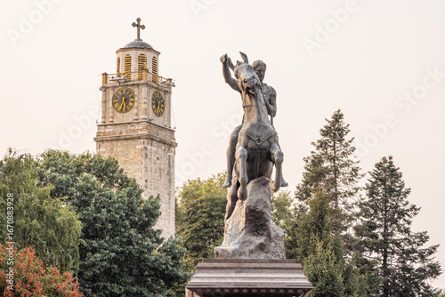 Clock tower and equestrian statue of King Philip of Macedonia.