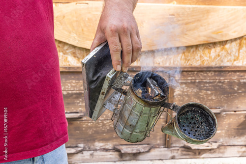 Smoker for use with honey bee hives.