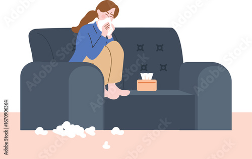 Woman blowing her nose on a couch due to illness