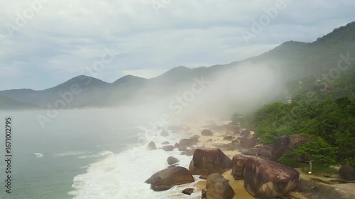 Aerial view over the Trinidade beach, cloudy day with fog in Brazil, South America