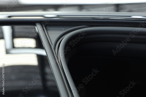 closeup of elastic rubber on car door.	