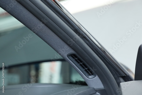 closeup of elastic rubber on car door.	
