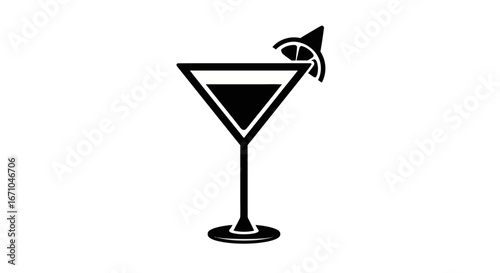 Black and white martini glass with a lime wedge.