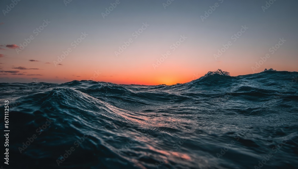 Fototapeta premium Majestic ocean waves at sunset.