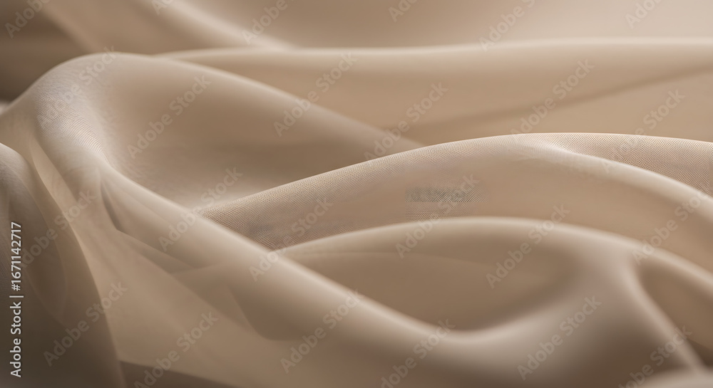 Obraz premium A close-up photograph showcasing the delicate and soft folds of a sheer, beige fabric, conveying a sense of elegance and subtle beauty through its light and shadow interplay and fluid texture