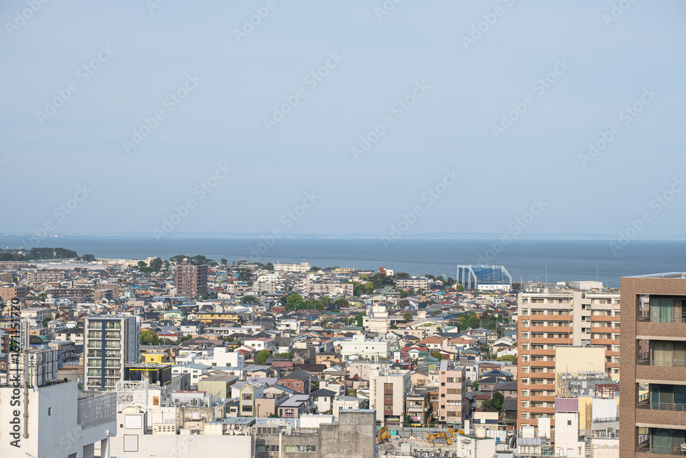 Obraz premium Odawara city in Kanagawa, Japan, Cityscape with buildings and ocean view under clear sky