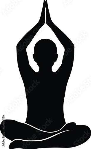 Silhouette of a person in a lotus yoga pose with hands in prayer
