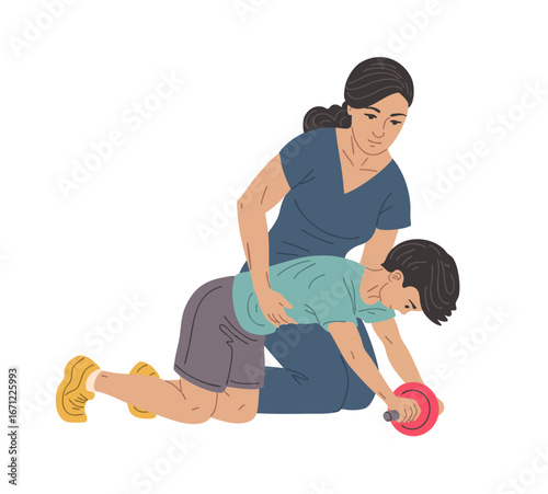 Female physiotherapist helping boy with ab roller exercise for core rehabilitation