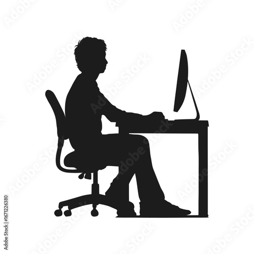 A person is seated at a desk, engaged in work on a computer. The setting is quiet, indicating concentration and productivity. The dim lighting suggests evening hours.
