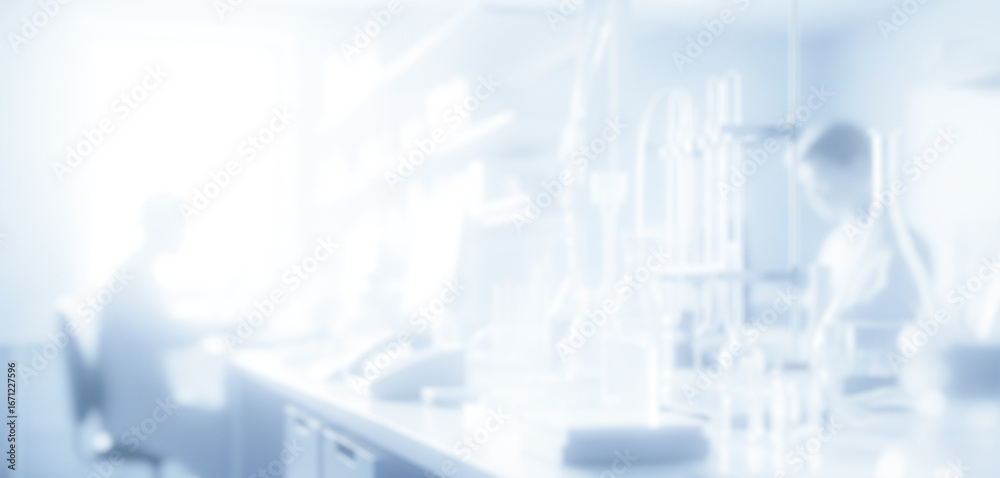 Fototapeta premium Blurred image of people working in a bright white laboratory environment, reflecting modern scientific collaboration with advanced equipment and clean professional workspace.
