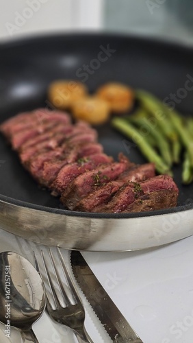 steak on a frying pan