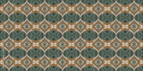 Green and orange seamless geometric pattern for textile or wallpaper. Ethnic motive