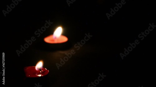 Hand made oil lamps decorated with Rangoli in the festive night of Hindu festival Diwali or Deepavali