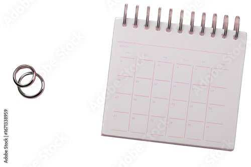 Pink calendar with wedding rings