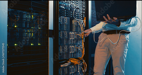 Canvastavla Hands, laptop and system test in server room for diagnostics, troubleshooting and maintenance
