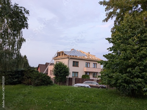 Rooftop framing and second-floor construction of family house vertical expansion project	
