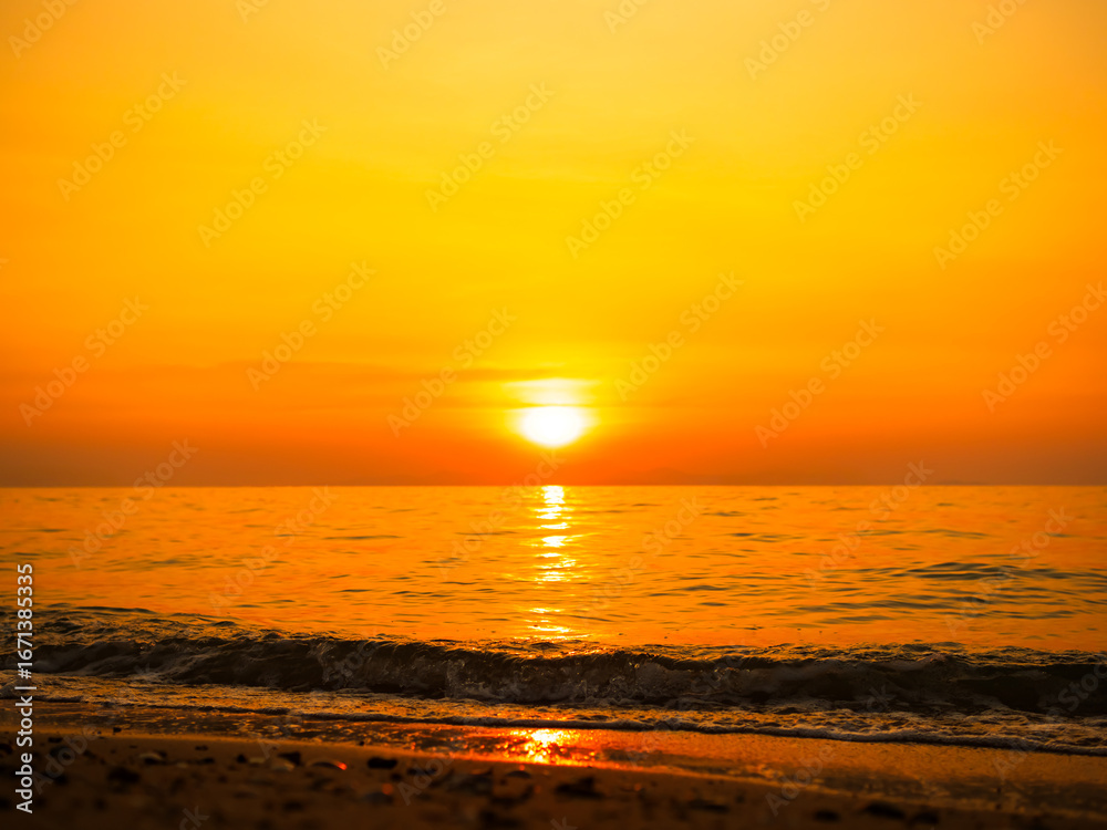 Fototapeta premium Sea sunset sky evening sunrise cloud weather dramatic landscape goldent and indigo color gradient pastel horizon, twilight yellow golden reflection morning nature environment energy ecosystem change.