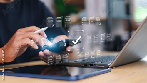 Photos Businessman Take an assessment, Check list, questionnaire, evaluation, filling out an online survey form