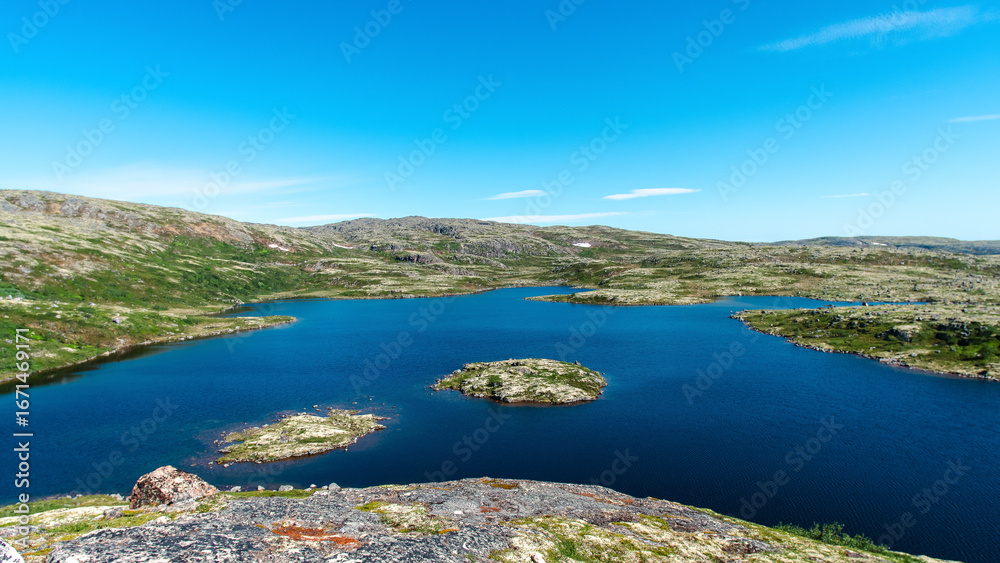 Obraz premium landscape Russian North view in the tundra with a mountain river and a lake in the mountains