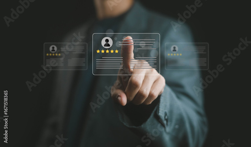 Canvas Print Businessman hand selecting five star customer review profile on virtual screen,