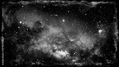 Starry expanse in monochrome, speckled with bright lights and a textured, dark frame