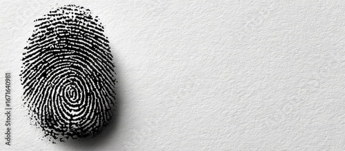 Black fingerprint on white surface