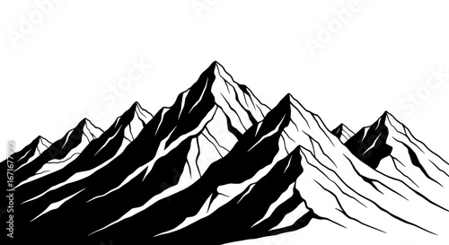 Dramatic mountain range silhouette with jagged peaks and deep shadows creating a stark and powerful landscape scene