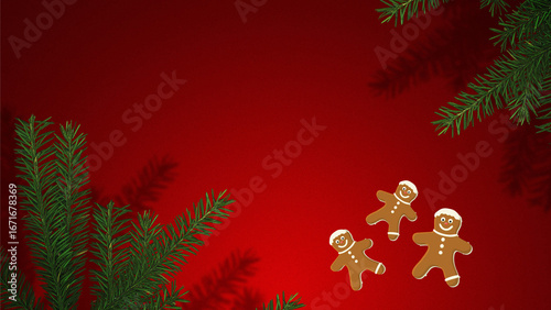 Christmas tree branches and gingerbread on a red background
