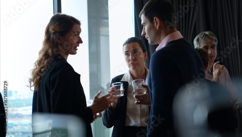 Wallpaper Mural Business professionals networking and enjoying drinks at a corporate event Torontodigital.ca