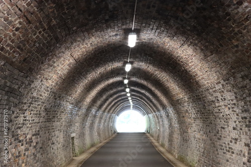 View along a pedestrian and cycle tunnel on a disused railway line