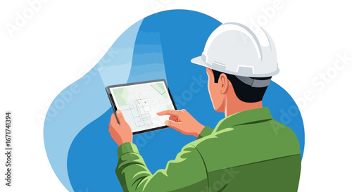 Worker in hard hat using tablet for site inspection