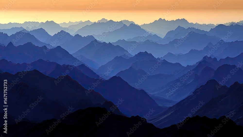 Fototapeta premium Layered mountain ranges in shades of blue.