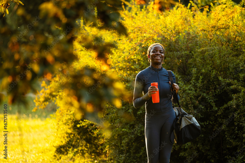 Motivated female athlete ready for training. Close up view of motivated black female athlete thinking about training. Motivated female athlete ready for training. Close up view of motivated black female athlete thinking about training.