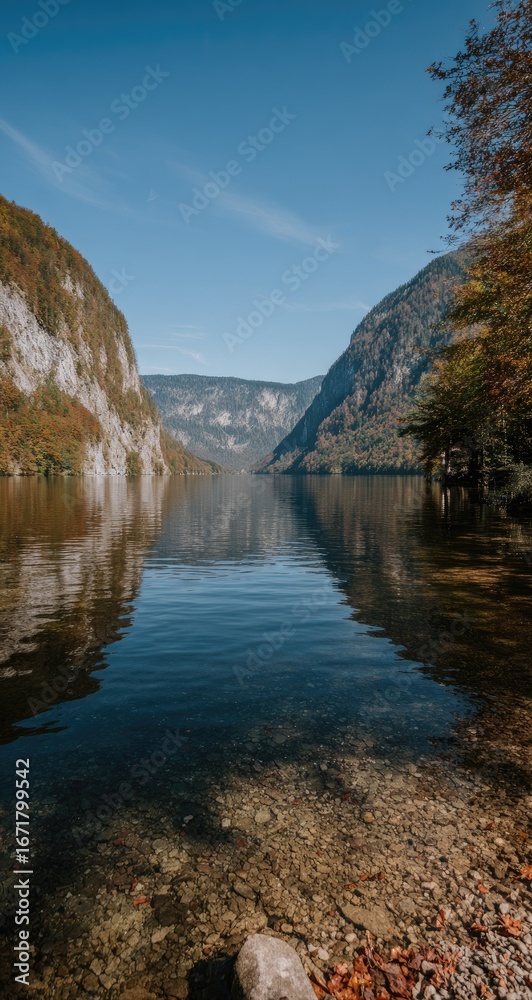 Fototapeta premium Serene lake nestled within a mountain valley.