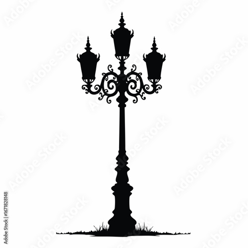 Black silhouette of a vintage triple lamp post with ornate details