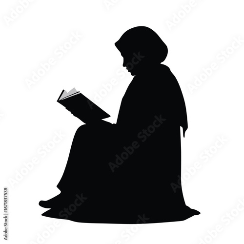 Black silhouette of woman wearing hijab reading book