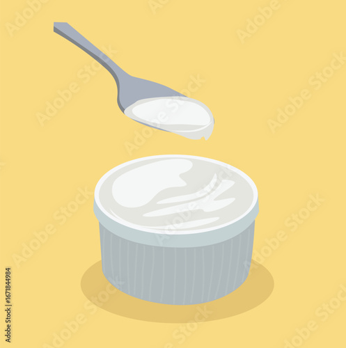 yogurt in a bowl. White yogurt or sour cream in bowl with spoon. 