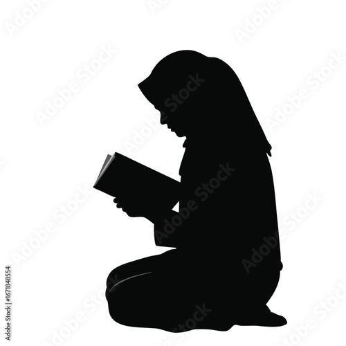 Silhouette of a person wearing a hijab reading a book 2