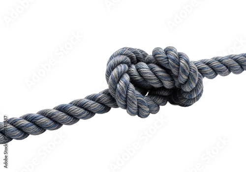 Meticulously tied indigo hemp rope, speckled with grey, forming a sturdy square knot diagonally on a transparent studio background with copy space. Concept of robust craftsmanship