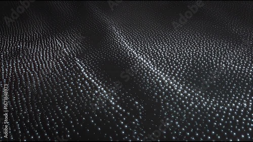 Dynamic digital wave of glowing particles in dark abstract background, representing data flow and technology.