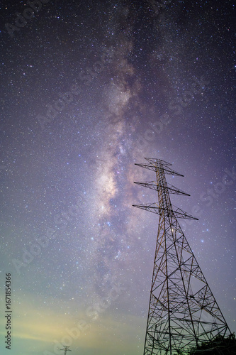high voltage tower at night