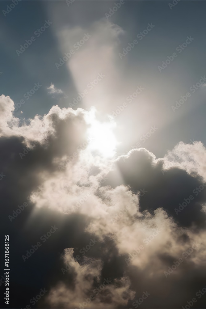 Obraz premium Sunlight breaks through dark clouds.