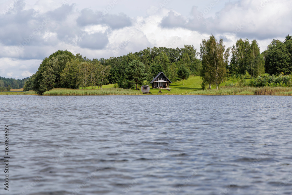 Fototapeta premium Cozy Cabin on a Lake