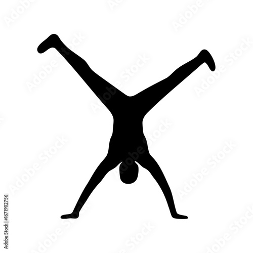 Black silhouette of person performing a handstand with legs spread apart