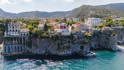 Aerial photo of the Sorrento Coast with the Marinella ridge in Sant'Agnello overlooking the blue sea, a scenic view of Naples, Italy.