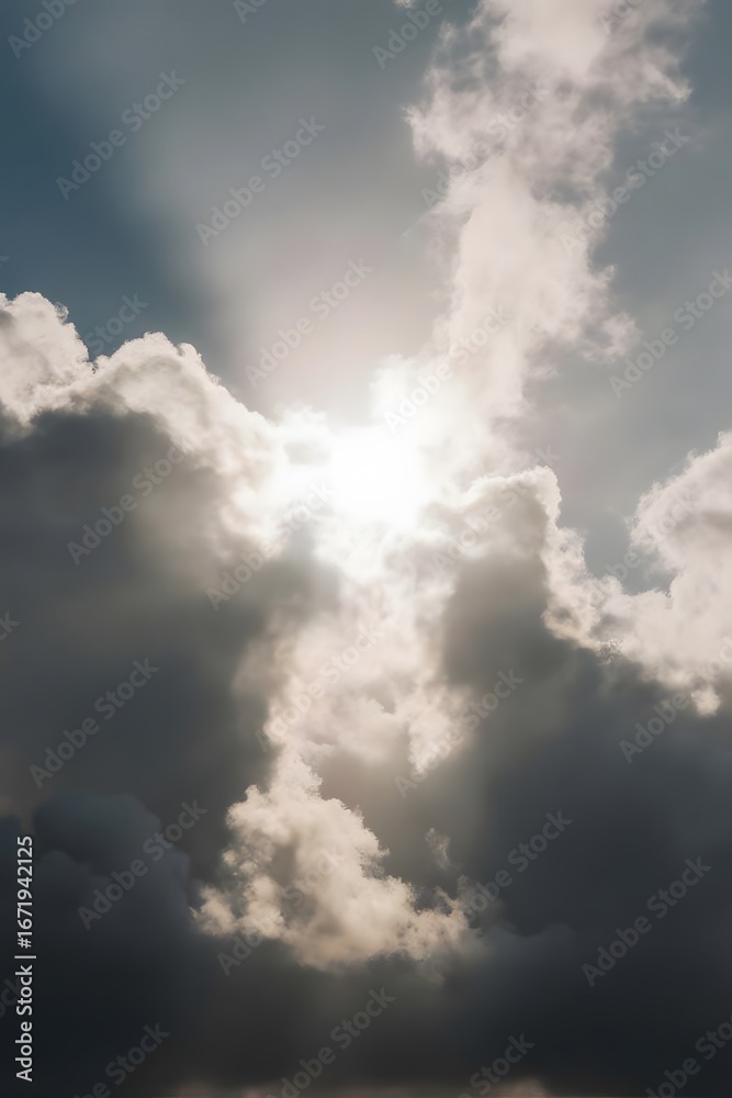 Fototapeta premium Sunlight breaks through dark clouds.