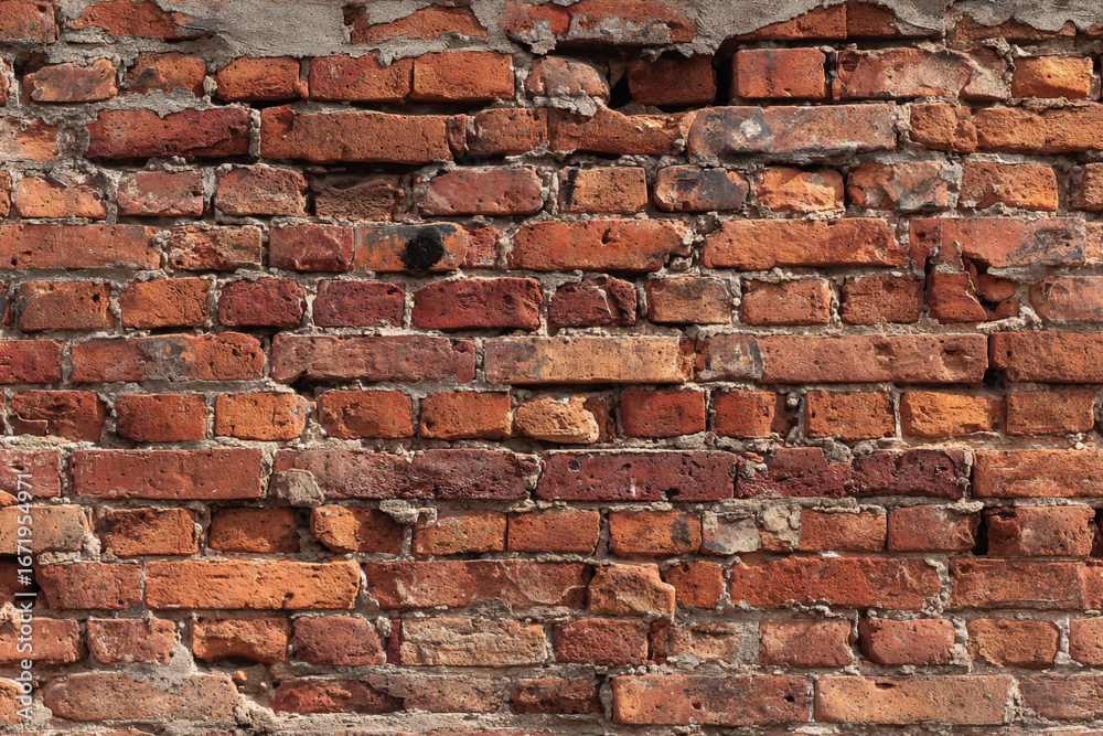 Obraz premium Old weathered red brick wall texture background