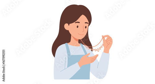 Woman examining a delicate rose gold necklace with heart-shaped pendants