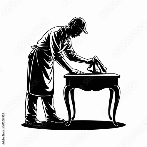 Artisan Cleaning a Wooden Table in Black and White