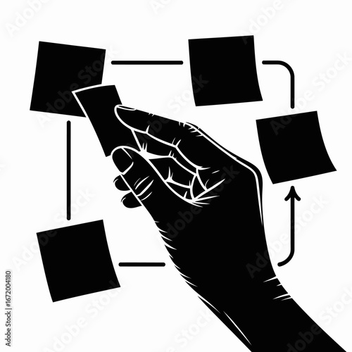 Hand placing sticky note in workflow diagram